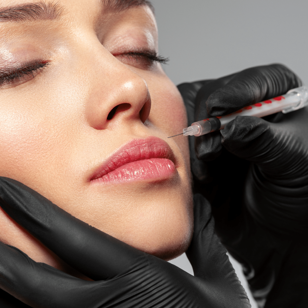 A woman being injected with botulinum toxin