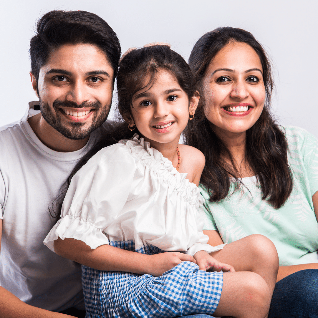 A family featuring a father, mother, and child