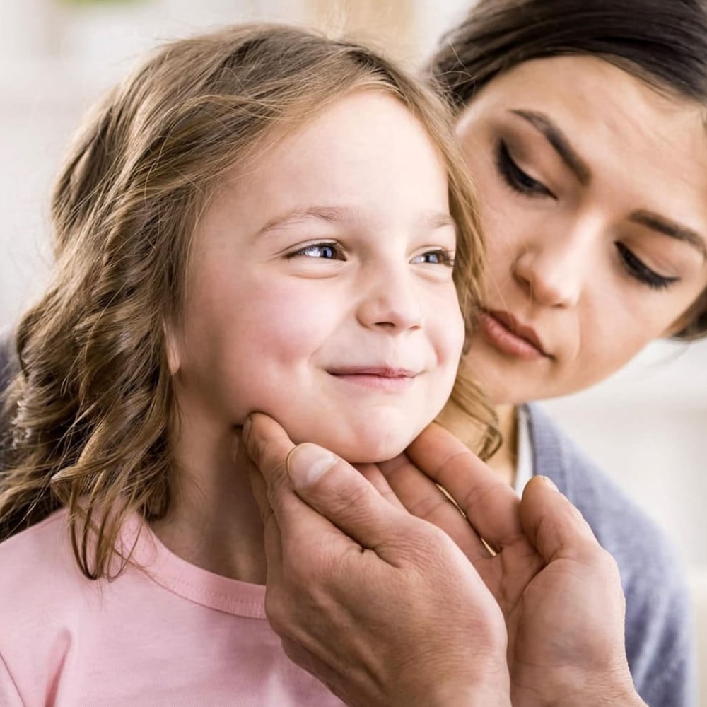 Mother and daughter visiting a clinic